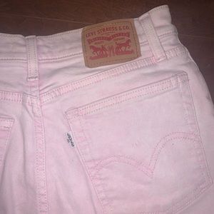 Baby pink Levi’s Wedgie Skinny Fit with a raw hem